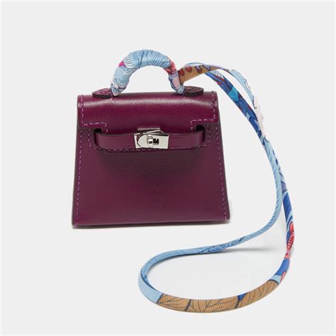 hermes mini shopping bag charm|hermes twilly on bag.